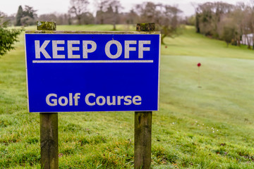Sign saying "Keep Off Golf Course"
