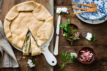 Savory pie stuffed with vegetables and bacon