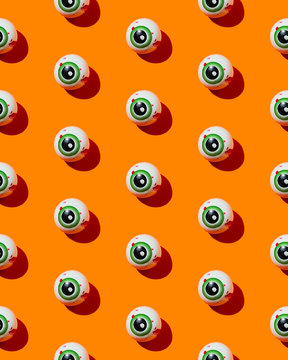 Halloween eye candy on orange background
