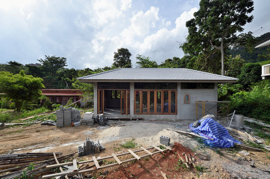 Exterior view of a modern holiday villa under construction