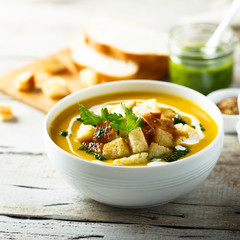 Pumpkin soup with homemade pesto sauce
