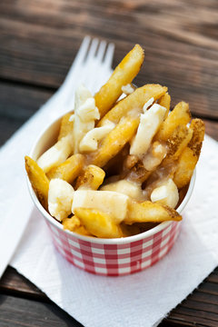 Overhead View Of Poutine In Cup On Table