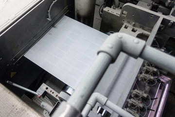 Printing Machine Running Web Blurrzy from Control Panel Booth Above Dusty