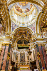 Fototapeta na wymiar Altar and dome of Saint Paul's Cathedral, Mdina, Malta.