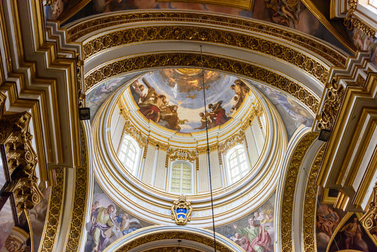 Ornately painted dome of Saint Paul's Cathedral, Mdina, Malta.