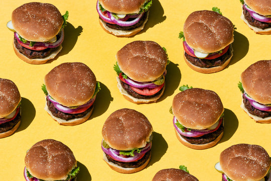Pattern Of Delicious Hamburgers On Yellow