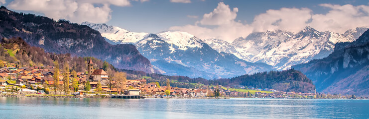 Brienz town on lake Brienz by Interlaken with the Swiss Alps covered by snow in the background, Switzerland, Europe - obrazy, fototapety, plakaty