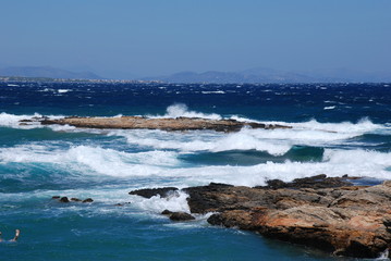 Fototapeta na wymiar Stormy seas at the Hamolia beach near the city of Athens. Vravrona region, Attica, Greece.