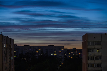 City landscape during a sunset, a view of city residential multystoried buildings