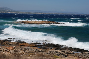 Fototapeta na wymiar Stormy seas at the Hamolia beach near the city of Athens. Vravrona region, Attica, Greece.