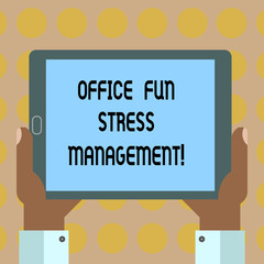 Word writing text Office Fun Stress Management. Business concept for Relax leisure time at work relaxing moments Hu analysis Hand Holding Blank Screen Tablet Smartphone Display Unit photo