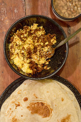 Mexican breakfast, machaca from Sonora with eggs, beans and flour tortillas