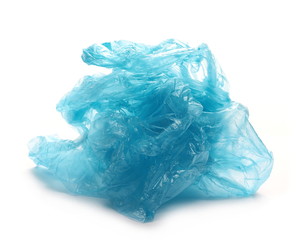 Fototapeta premium Crumpled plastic blue garbage roll ball isolated on white background