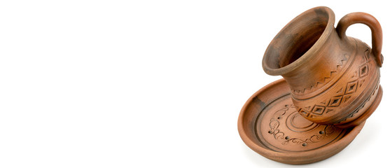 Ceramics cup and saucer isolated on white . Wide photo. Free space for text.