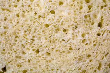 Homemade bread closeup, natural background texture.