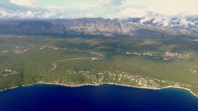 Aerial view over Krk island coast from distance .Croatia.Summer.2018. 