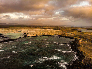 sunset on coast of sea