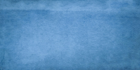 Blue wide grunge effect texture.
