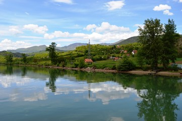 Fototapeta premium reflection in the calm waters of the lake