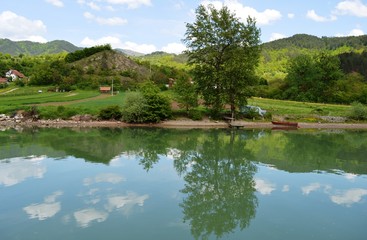 Fototapeta na wymiar reflection in the calm waters of the lake