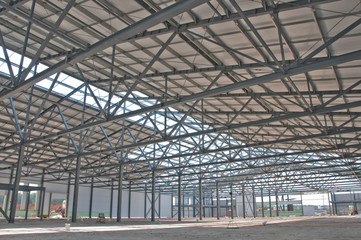 Structure of steel for building construction. The steel structure of the new building for further construction. Metal frame for the installation of insulation panels.