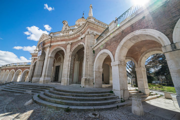 Fototapeta na wymiar Church of San Antonio in Aranjuez, Madrid, Spain. Stone arches and walkway linked to the Palace of Aranjuez