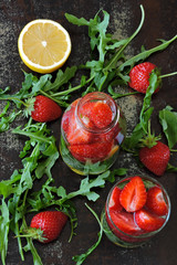 Detox drink with strawberries and arugula. Summer drink in the heat.