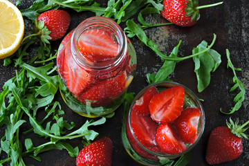 Detox drink with strawberries and arugula. Summer drink in the heat.