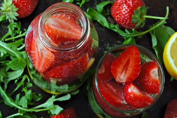 Detox drink with strawberries and arugula. Summer drink in the heat.