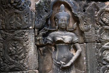 Fototapeta na wymiar Carvings in Angkor Empire Temple Cambodia