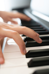 Obraz premium piano keys and playing piano