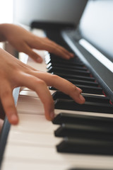 Obraz premium piano keys and playing piano