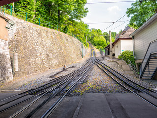 Cog railway tracks with an additional toothed rack located in the middle of the track to overcome...