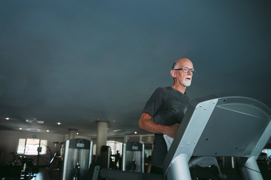 Man exercising on treadmill
