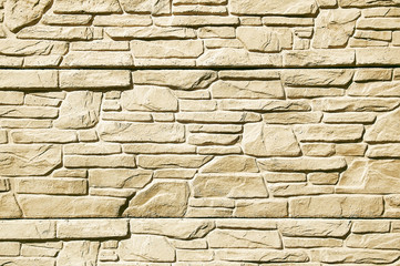 Old beige stone pavement background texture