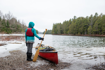 Girl Paddle Spring Red Canoe Trip Backcountry Wilderness Snow