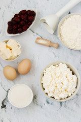 Ingredients for the preparation of cake with cherries: flour, baking powder, eggs, cottage cheese, butter, sugar and cherry