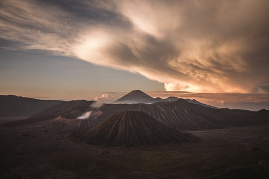 Sun rises above Mount Bromo and Mount Semeru, Java, Indonesia
