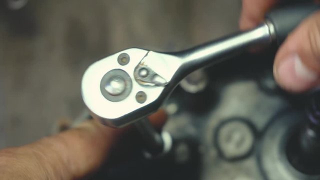 Ratchet Head Closeup In Action By Engine Valves