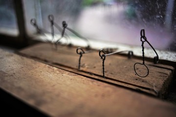 Homemade wooden mousetrap closeup. Safe alternatives for getting rid of mice in your home