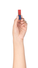 hand holding Red blue magnet isolated on a white background