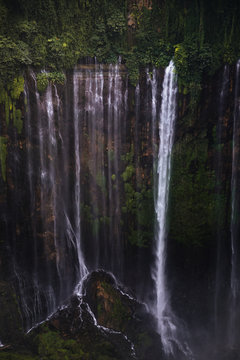 close up of huge waterfall in deep jungle