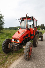 Vintage tractor by barn