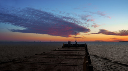 Beautiful sunrise at sea. View from bridge of cargo vessel.