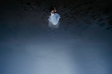 Top-view at the girl on the shore