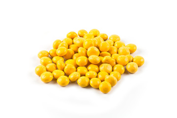 Yellow candies group isolated on white background.