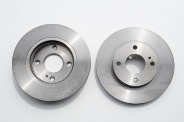 Front and rear view of new car brake discs