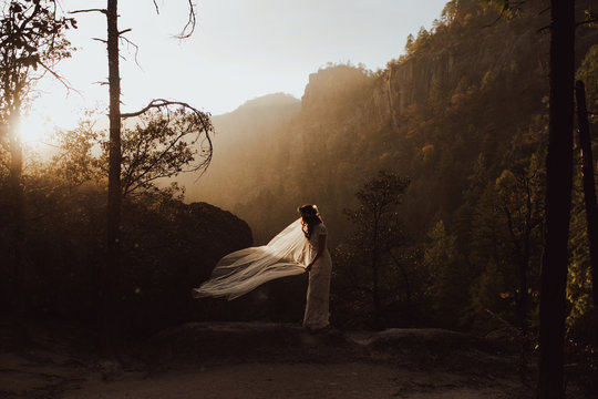 Bride in Nature at Sunset