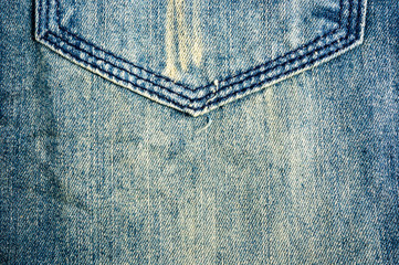 clothing items blue stonewashed faded jeans cotton fabric texture with seams, clasps, buttons and...