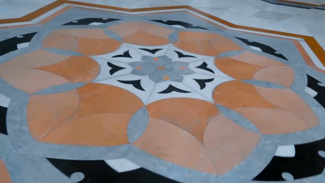 Marble floor with a beautiful pattern in the center. Shot in motion